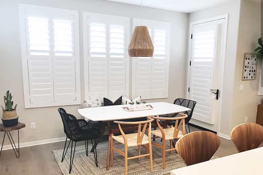 Use Polywood shutters to control natural light levels in your Bluff City dining room. Polywood shutters with top louvers tilted open in a dining room