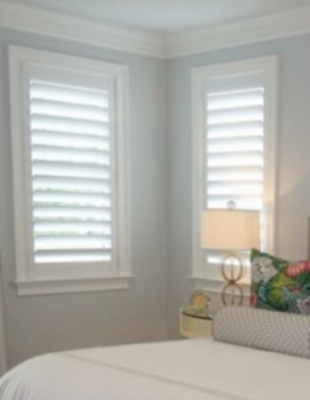 Hidden tilt rod shutters open. Plantation shutters with hidden tilt rods in Bluff City